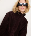 Jaqueta Oversized em Couro com Gola Alta e Barra Ajustada